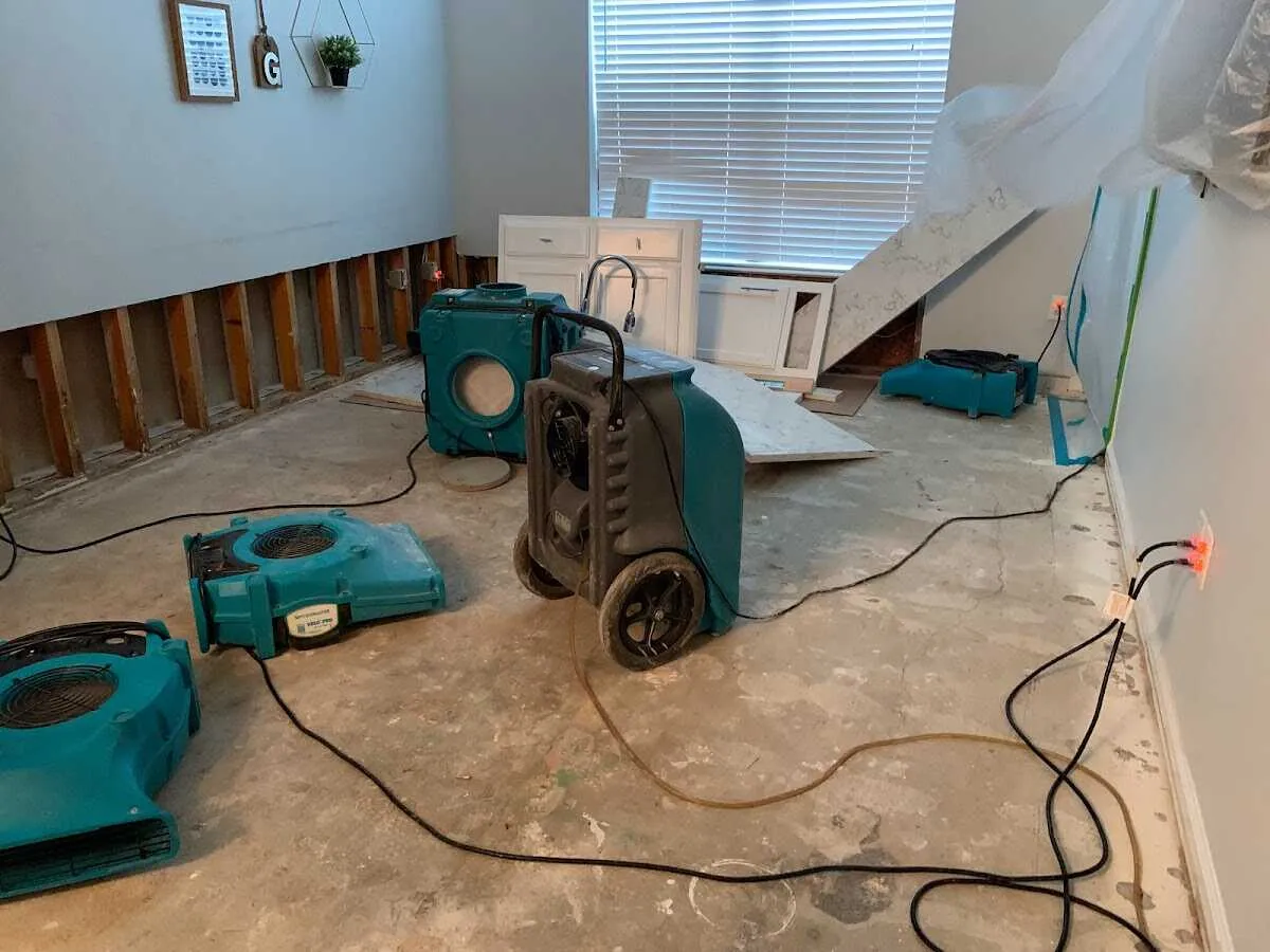 Dehumidifier in flood-cut room for Water Damage Restoration in O'Fallon